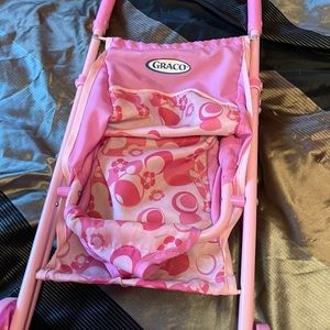 Pink doll stroller